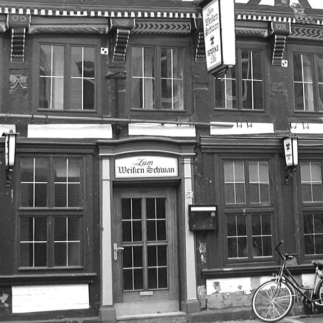 Historische Darstellung des Schwan Peine – traditionsreiches Gebäude mit Fachwerkarchitektur, bedeutender Kultur- und Veranstaltungsort mit Geschichte in der Peiner Stadtgeschichte.
